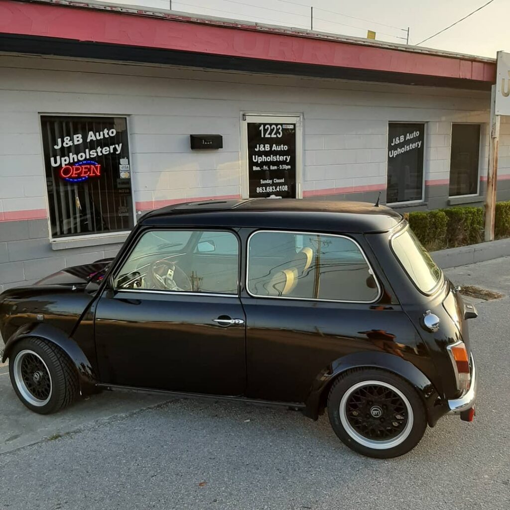 black mini car - glass repair