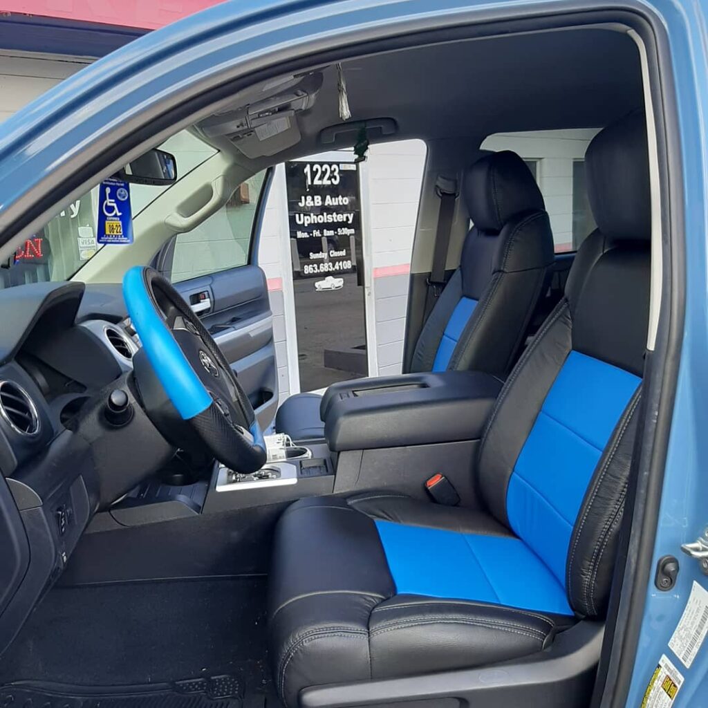 truck interior, black and blue leather seats